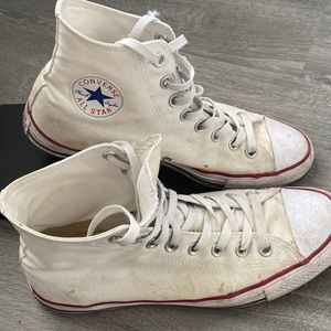 *Classic white high top Converse sneakers*